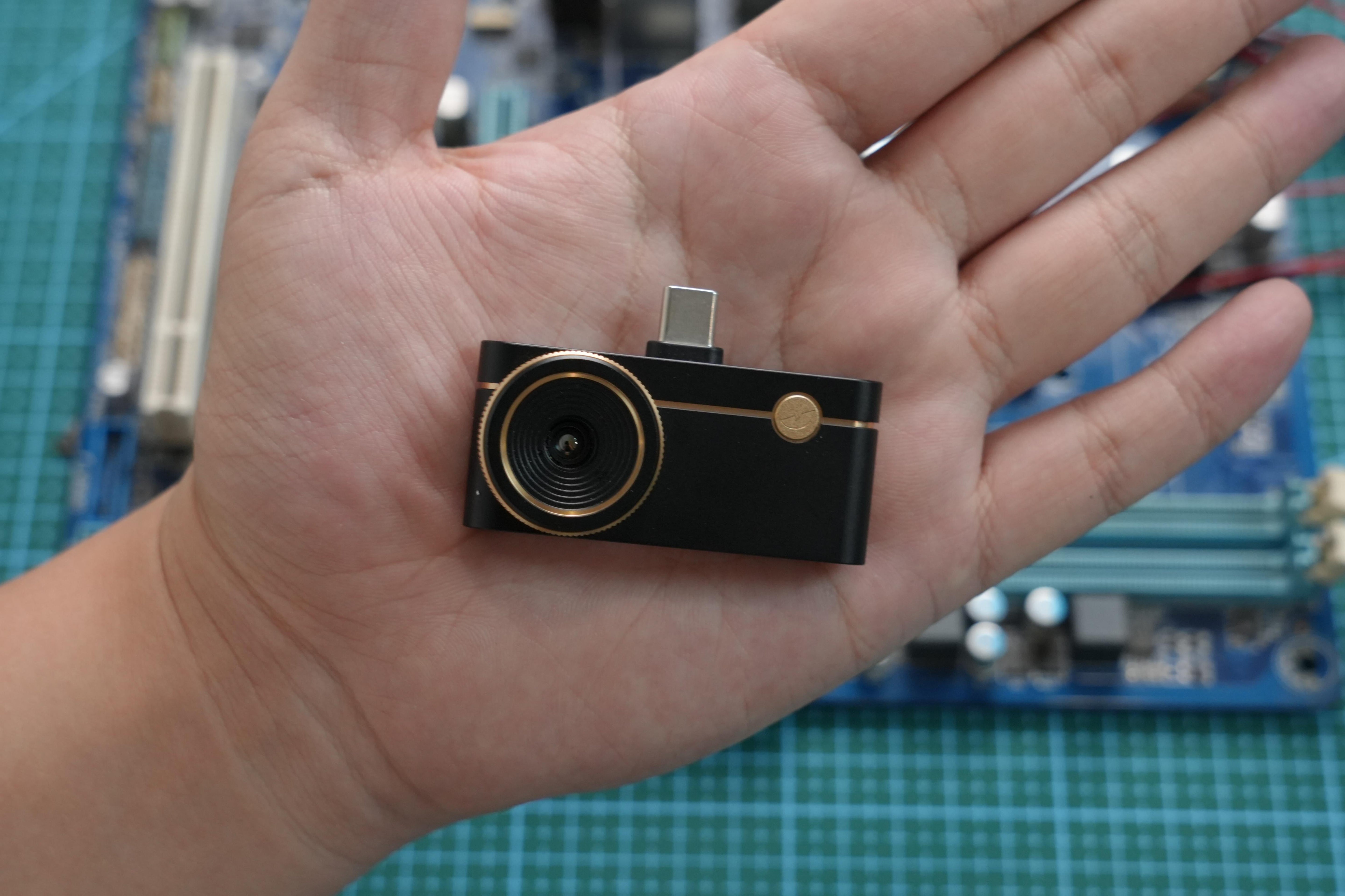 Thermal Master P3 compact USB-C thermal camera held in hand, showing its portable pocket-sized design.