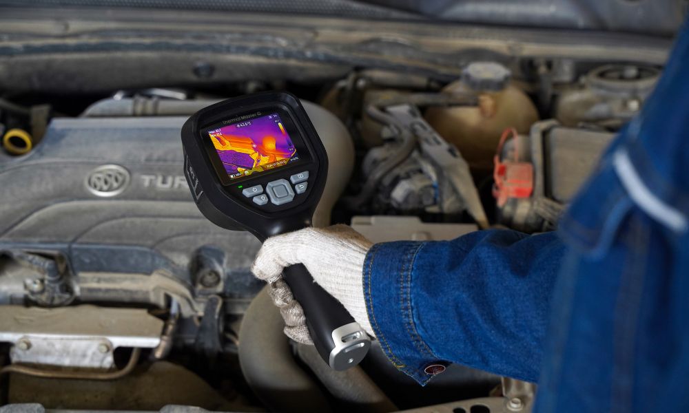 Using a handheld thermal imager to inspect a car alternator