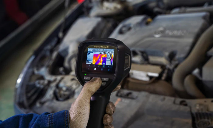 Using handheld thermal imaging to inspect cars