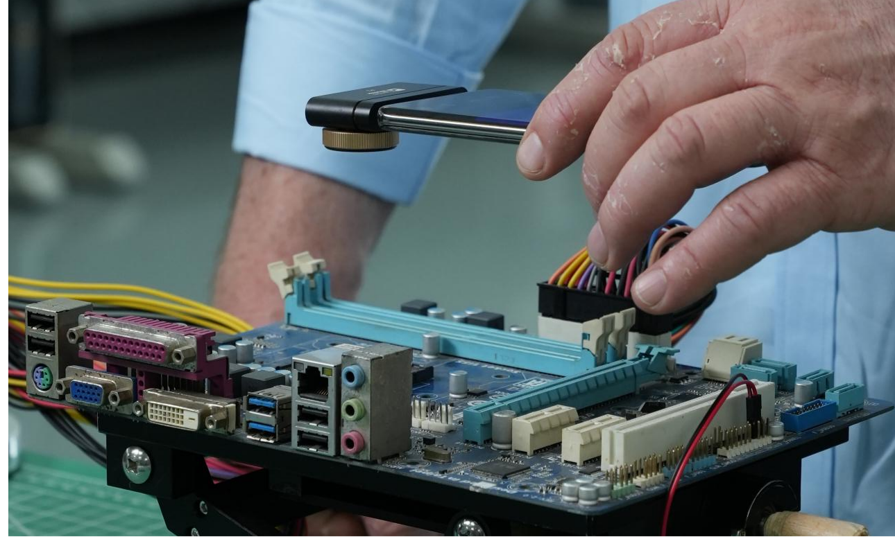 Using a mobile phone thermal imager to inspect electronic components.