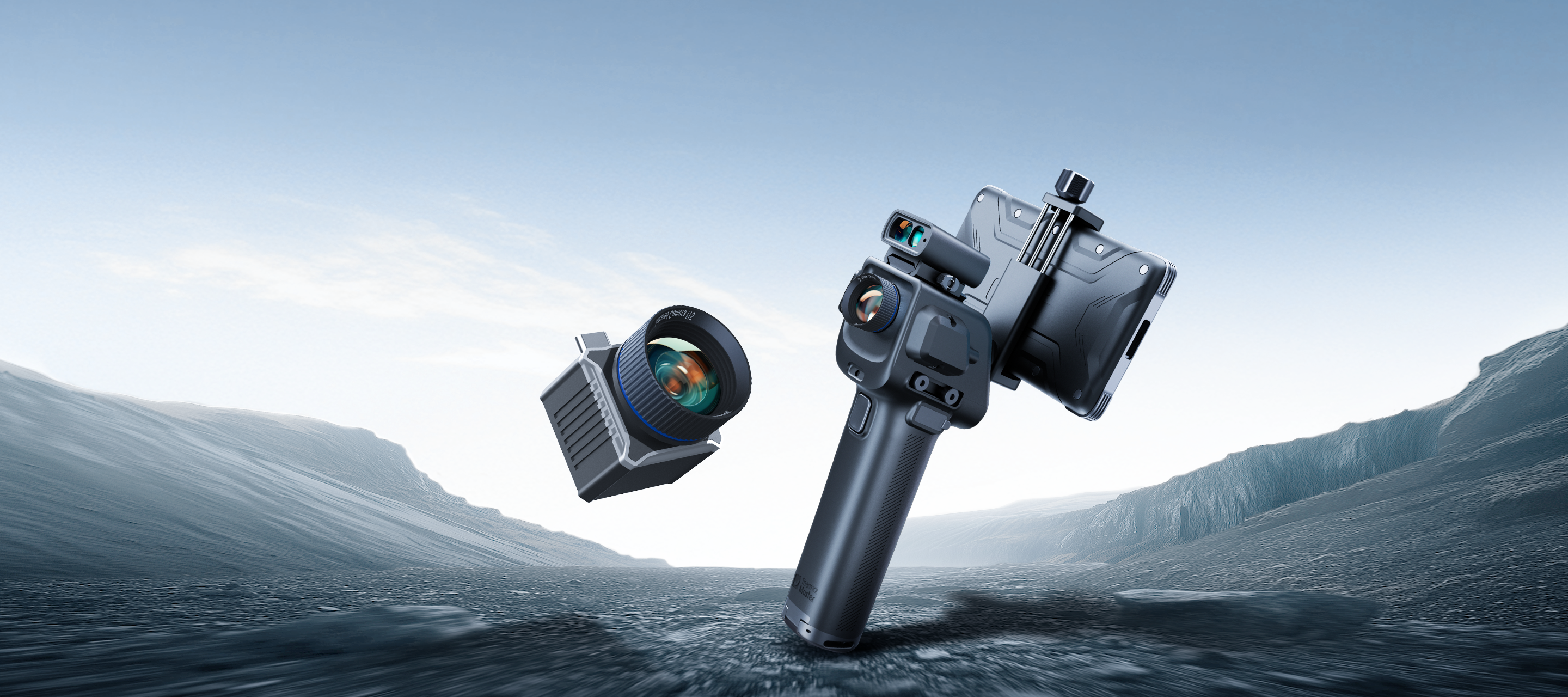Thermal Master T2Max thermal monocular with detachable lens and smartphone mount, displayed in a rugged outdoor environment.