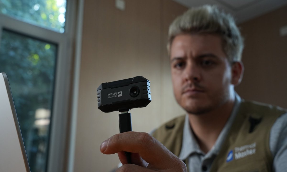 The man was holding a Thermal Master P1.