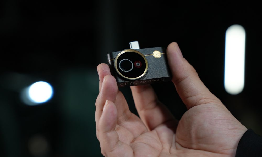 Holding the Thermal Master P3 in my hand.