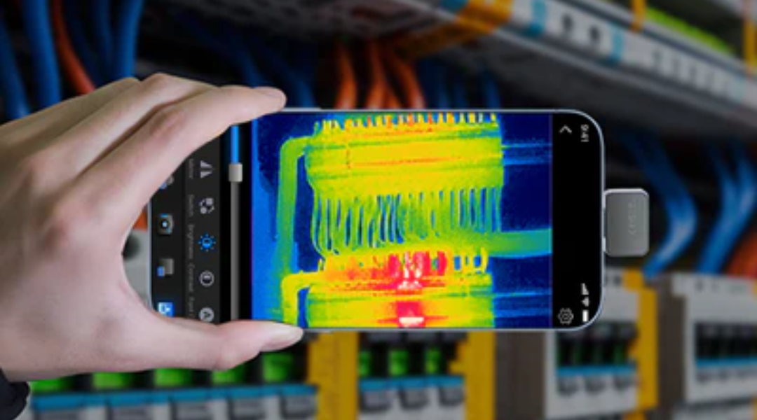 Using a mobile phone thermal imager to inspect the electrical cabinet circuitry